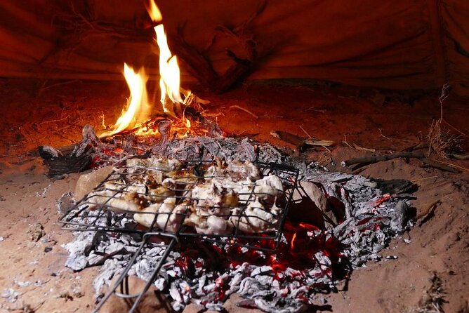 2 Day Wadi Rum Tour: Traditional Dinner and Starlit Cave Camp - Red Sand Dunes and the changing color of Wadi Rum