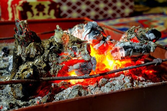 Dinner with a local family in Petra , hotel transfers included . - Tea, conversation, and the closing sahtain
