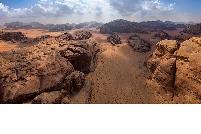 Discover the treasures of Jordan 8-Day Tour - Wadi Rum’s red sandstone and short 4x4 ride