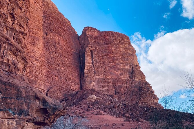 Explore Wadi Rum: Jeep Tour, Bed and Breakfast, and Dinner - Al-Khazali and its ancient inscriptions
