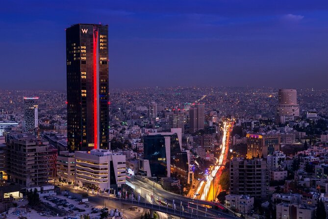 From Amman: Full-Day Tour to Amman City and Desert Castles - The desert road leads to Qasr Amra’s unusual art