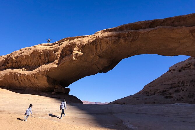 Full-Day 8 Hour Jeep Tour into Wadi Rum Protected Area with Stay - Abu Khashaba Canyon adds the best walk