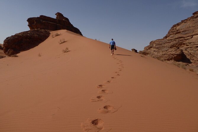 Full-Day 8 Hour Jeep Tour into Wadi Rum Protected Area with Stay - Lawrence’s Spring and the first red-rock views