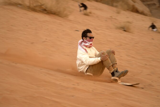 Full-Day Jeep Tour and Sleeping in cave Night Under the Stars - Al Ramal Red Sand Dune and free sandboarding