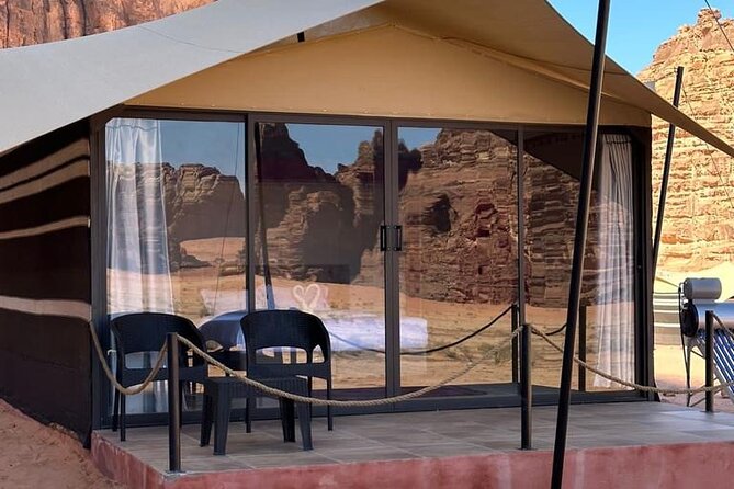 Full-Day Jeep Tour & Sleep in Luxury Tent with private Bathroom - Reading the carvings at Khazali Canyon