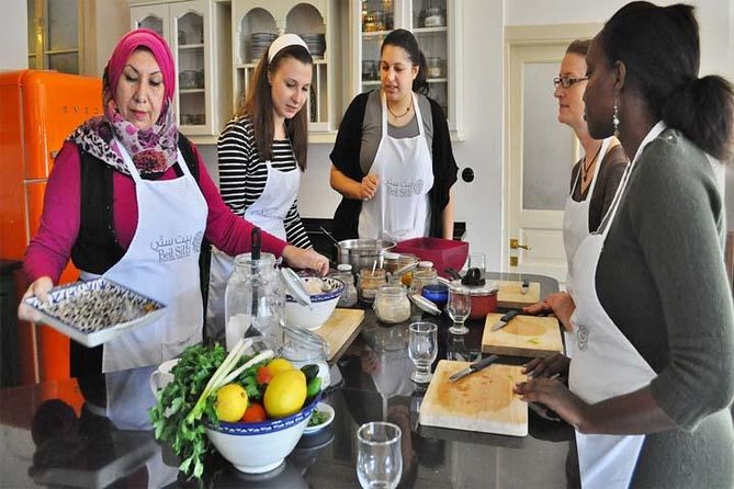 Half Day Cooking Class Experience with Amman Panoramic Tour - Sitting down to eat what you made