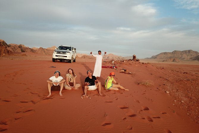 Half-Day Jeep Safari "Wadi Rum Highlights!" w/ Professional Bedouin Guide - Red dunes, sandboarding, and open desert views