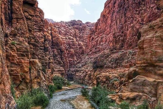 Wadi Al Mujib Adventures From Amman, QAI Airport, Deadsea or Madaba - Following the Siq Trail through water and red rock
