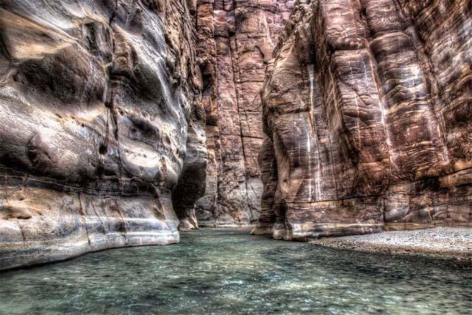 Wadi Mujib Siq Trail Hiking Experience from Dead Sea - Reaching the 18-meter waterfall