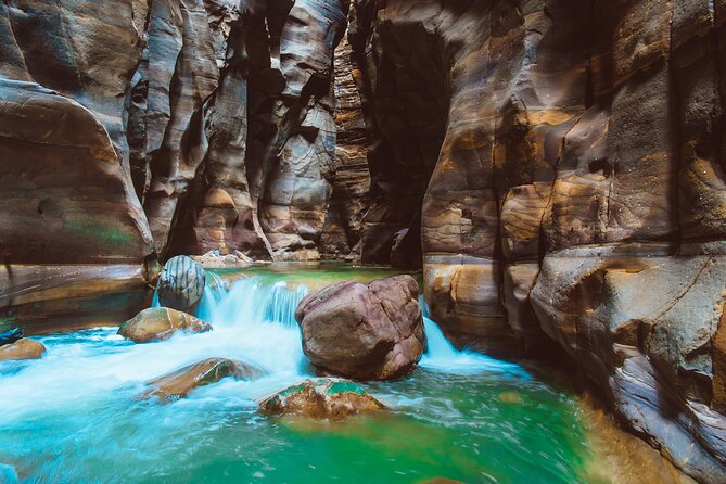 Wadi Mujib Siq Trail with Amman Panoramic&Optional Dead Sea Visit - The waterfall and pools: the payoff of the hike