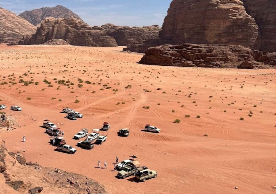 Wadi Rum:Full Day Tour Lunch Sand boarding Camel Ride Sunset - Lawrence’s Spring and the first taste of desert history