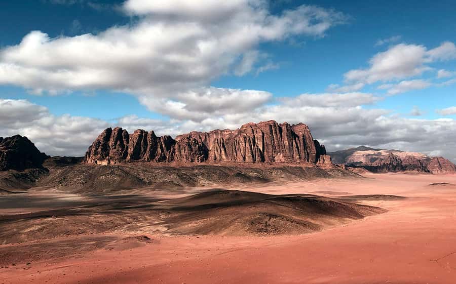 Wadi Rum:Full Day Tour Lunch Sand boarding Camel Ride Sunset - Bedouin lunch, tea, and the human side of the tour