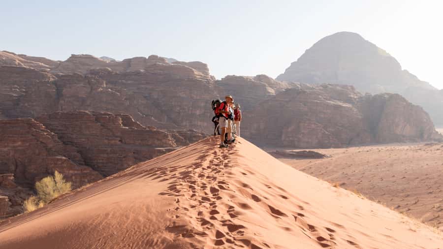 Wadi Rum: Guided Jeep Tour With Overnight Stay and Meals - Khazali Canyon and the rock bridges