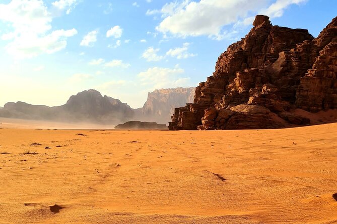 Wadi Rum Jeep Tour with Cave Camping, Save 30% - Meeting a Bedouin family along the way